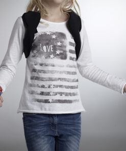 Young child wearing Medtronic pump harness with pump pocket on back