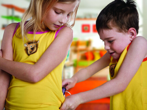 Child wearing Lenny tank top with pump pocket visible