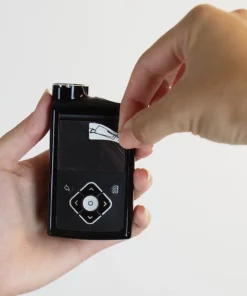 Close-up of screen film applied smoothly on MiniMed pump