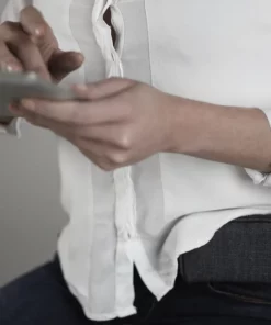 Denim case worn horizontally on waist belt