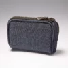 Denim insulin pump case clipped to belt with zipper closed
