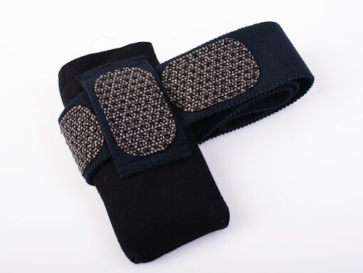 Close-up of gray gripper pads inside medtronic leg pouch belt